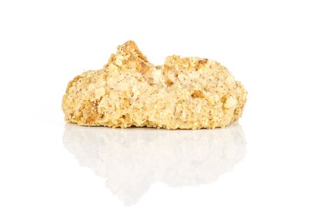 One whole crispy oat crumble biscuit isolated on white backgroundの写真素材
