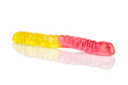 One whole colourful jelly worm candy isolated on white backgroundの写真素材