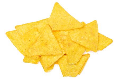 Lot of whole cheese tortilla chips stack flatlay isolated on white backgroundの写真素材