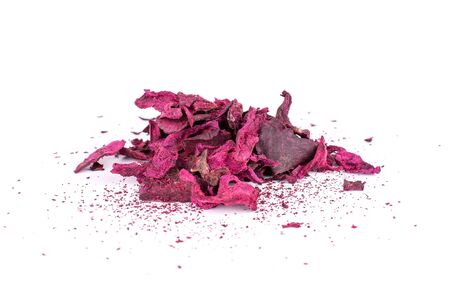 Lot of pieces of dried red beetroot isolated on white backgroundの写真素材