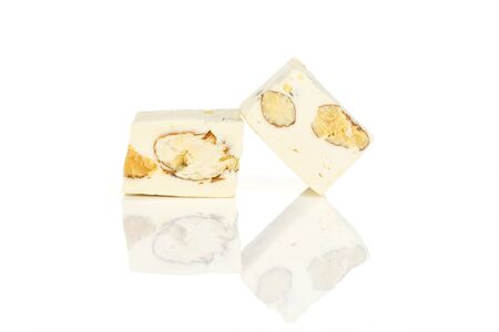 Group of two whole sweet white nougat isolated on white backgroundの写真素材