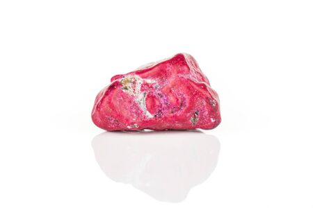 One whole purple sweet chocolate stone isolated on white backgroundの写真素材