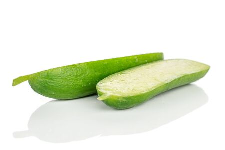 Group of one half one piece of mini green cucumber isolated on white backgroundの写真素材