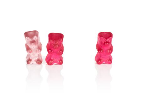 Group of three whole gummy bear isolated on white background