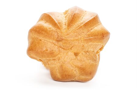 One whole fresh baked golden profiterole isolated on white background