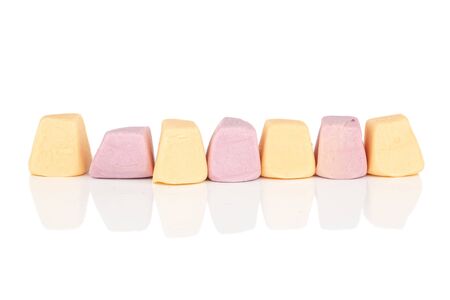 Group of seven whole soft pastel candy isolated on white backgroundの写真素材