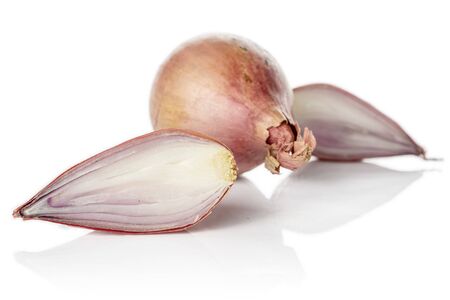 Group of one whole two halves of fresh brown shallot isolated on white backgroundの写真素材