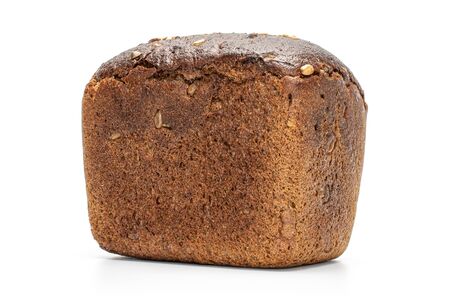 One whole fresh baked dark bread loaf isolated on white backgroundの写真素材