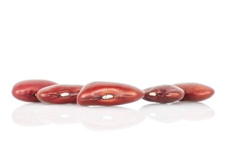 Group of five whole fresh red kidney beans isolated on white backgroundの写真素材