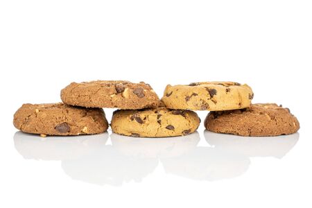 Group of five whole sweet brown cookie isolated on white backgroundの写真素材
