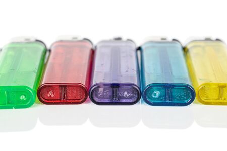 Group of five whole plastic lighter isolated on white background