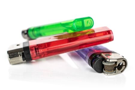 Group of three whole plastic lighter isolated on white backgroundの写真素材