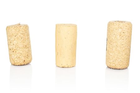 Group of three whole common wine cork isolated on white backgroundの写真素材