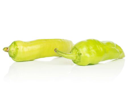 Group of two whole bright hot green pepper banana isolated on white backgroundの写真素材