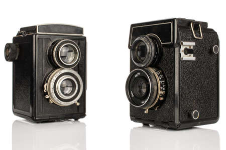 Group of two whole vintage camera two lens isolated on white backgroundのeditorial素材