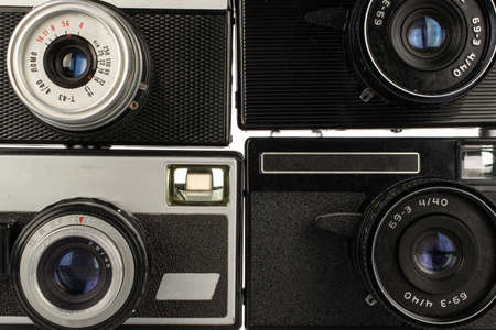 Group of four whole vintage camera closeup isolated on white backgroundのeditorial素材