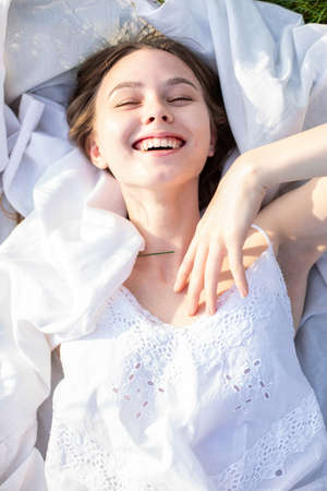 White young girl model smiling portrait on white