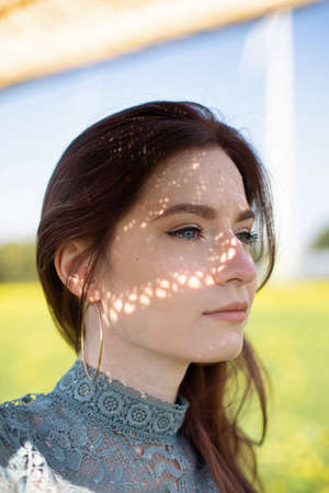 European white young girl with dark hair portrait with blue eyesの写真素材
