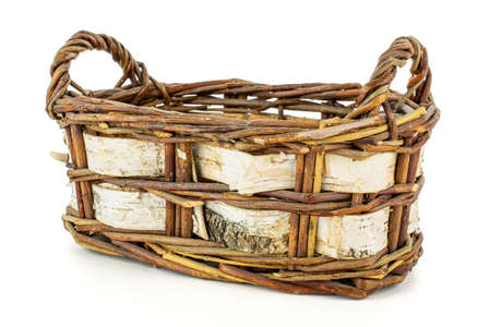 Basket with birch bark isolated on white backgroundの写真素材