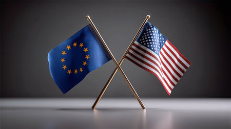 European and American flags crossed on a table symbolizing unity and cooperation conceptの素材