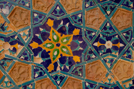 Fragment of ancient ceramic tiles on the facade of the baths in Tbilisiの写真素材