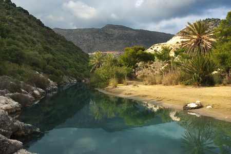 Bay with beach and palm trees in Turkeyの写真素材