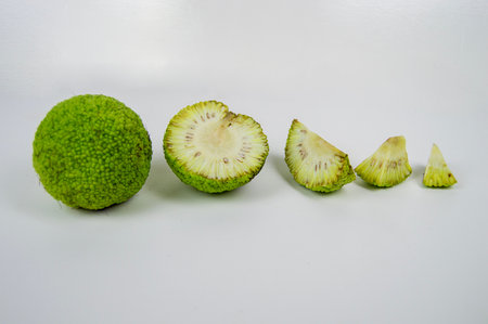 Adam's apple fruit on a light background (known as maclura pomifera fruit or osage orange)