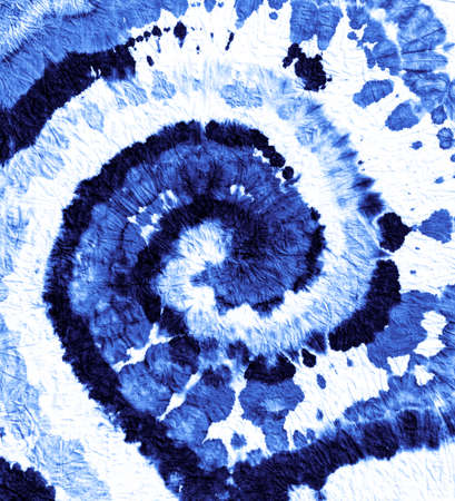 Sea Blue Grungy rough spiral color. Blueish Hippie style paint swirl. Navy Blue Hippie style batic texture. Indigo Tie dye batic texture. Tie dye classic swirl. Grungy rough batic texture.の写真素材