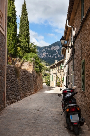 Narrow street old traditional houses village, Majorca island の写真素材