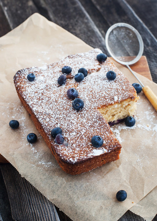 Homemade blueberry cake on wooden tableの写真素材