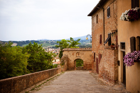 Narrow street in the old town Certaldo, Italyの写真素材
