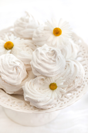 Homemade zephyr (russian marshmallows) on white backgroundの写真素材