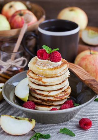 Stack of freshly prepared apple pancakes for breakfastの写真素材