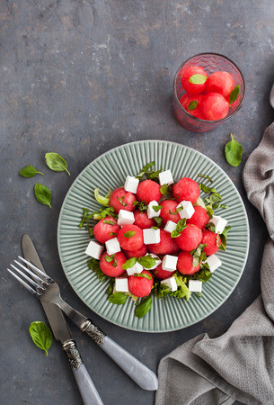 Fresh delicious salad with watermelon and feta cheese, top viewの写真素材