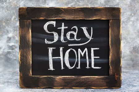 Social notice board with message stay at home の写真素材