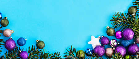 Colorful Christmas balls holiday banner, blue backgroundの写真素材