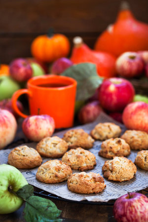 Homemade delicious apple cookies on rustic autumn background, selective focusの写真素材