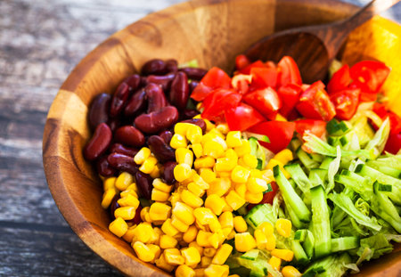 Fresh tomato, cucumber, beans, corn salad, Mexican style, close-upの写真素材