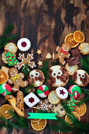 Sweet Christmas cookies on rustic table, top viewの写真素材