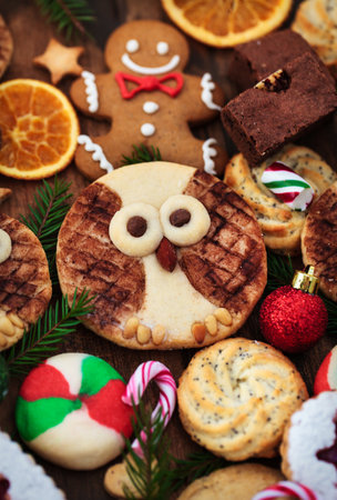 Sweet Christmas cookies on rustic table, top viewの写真素材