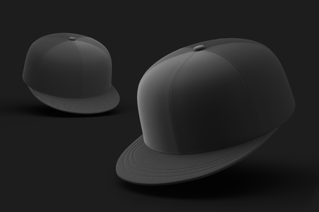 Two baseball caps isolated on a black backgroundの写真素材