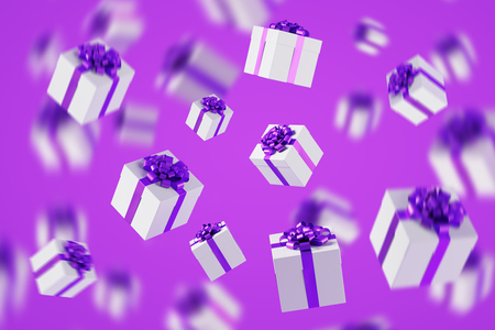Hanging in space white gift boxes with purple ribbon.の写真素材