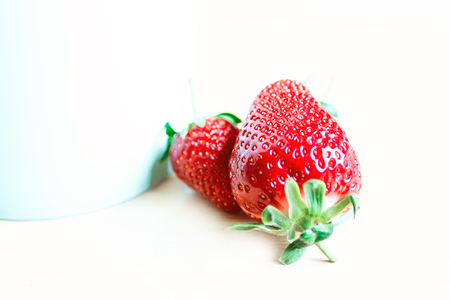 strawberries in a basket, summer colors in berries, background with strawberriesの写真素材