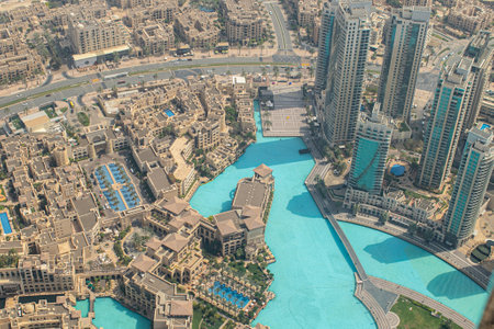 Skyscrapers and urban architecture infrastructure of Dubai downtown and Financial Center area from a bird viewの写真素材