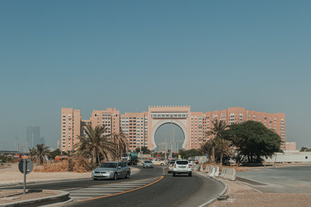 Dubai, UAE - October 6, 2020: Oaks Ibn Battuta Gate hotel building architecture with cityscape and road surroundingsのeditorial素材