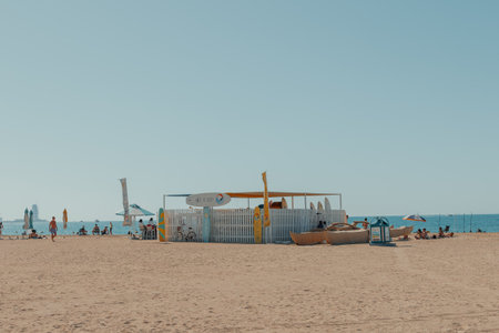Dubai, UAE - February 14 2020: Kite surfing rental shop on a sunny day at Kite Beachのeditorial素材