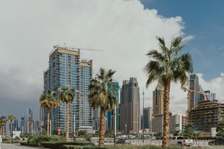 Dubai, UAE - February 12, 2020: Construction and modern skyscrapers in the financial district of Dubaiのeditorial素材