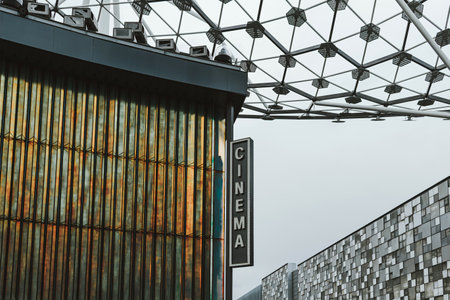 Contemporary cinema exterior with industrial architecture design