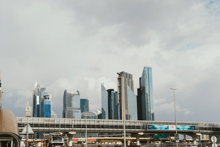 Dubai, UAE - February 12, 2020: Skyline view of Downtown Dubai with modern skyscrapers and metro...