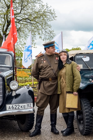 Kerch, Russia 05 09 2019: Parade Victory Day. People participate in the patriotic action Immortal Regiment. They are holding portraits of people who participated in the Great Patriotic War.のeditorial素材